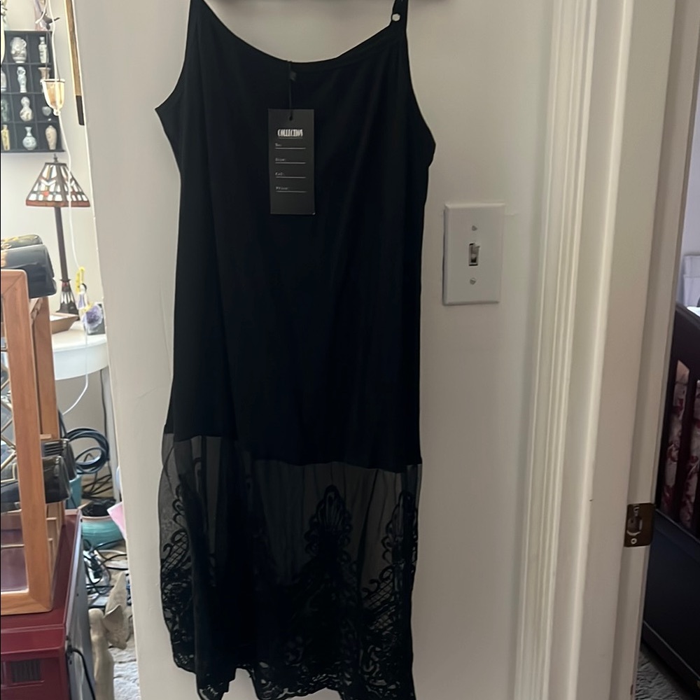 New Black slip with sheer lace on bottom.